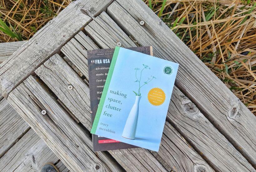 two books on a wooden bench