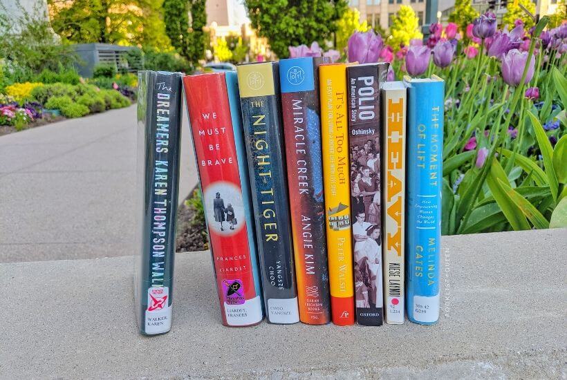 Bookstack among flowers