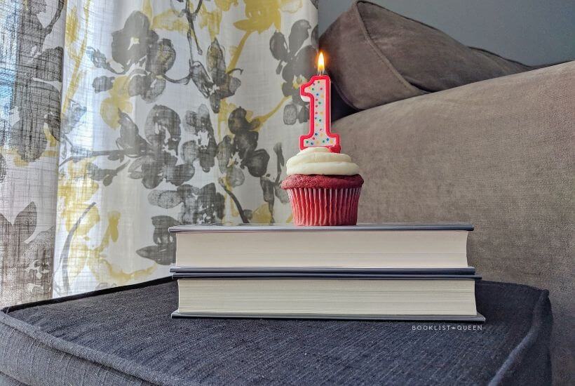Cupcake, number one candle, bookstack